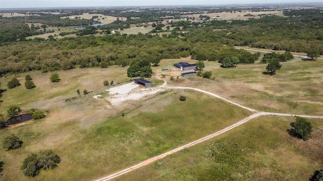 birds eye view of property featuring a rural view