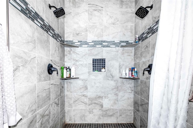 bathroom featuring curtained shower