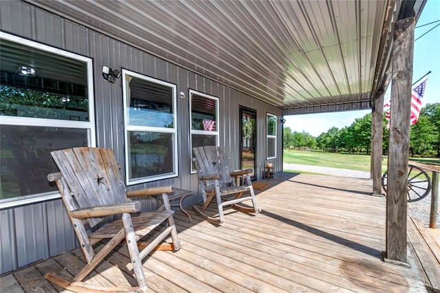 wooden terrace featuring a porch