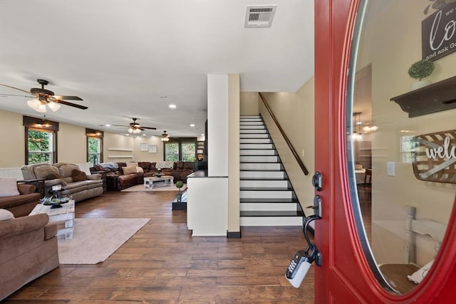 interior space with hardwood / wood-style flooring and ceiling fan