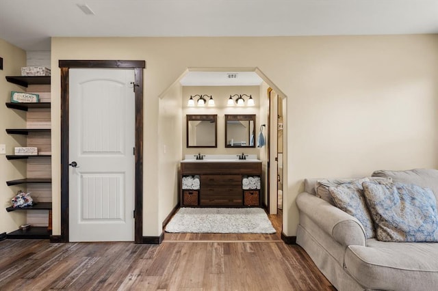 bathroom featuring vanity and hardwood / wood-style flooring