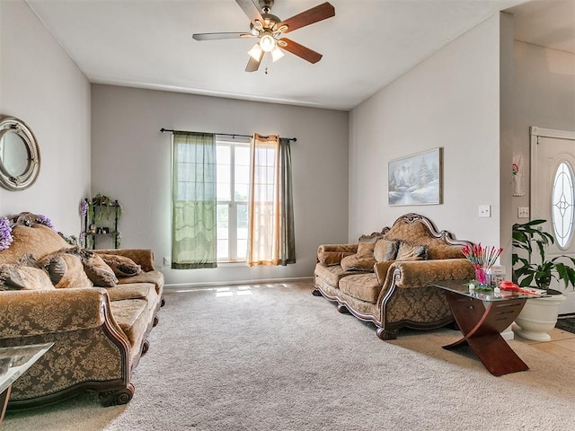 living room featuring ceiling fan and carpet floors