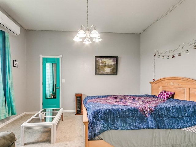 bedroom featuring a wall unit AC, carpet, and a notable chandelier