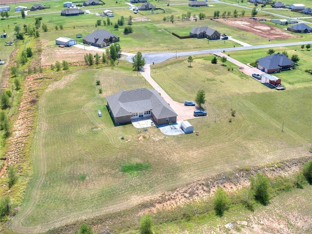 bird's eye view with a rural view