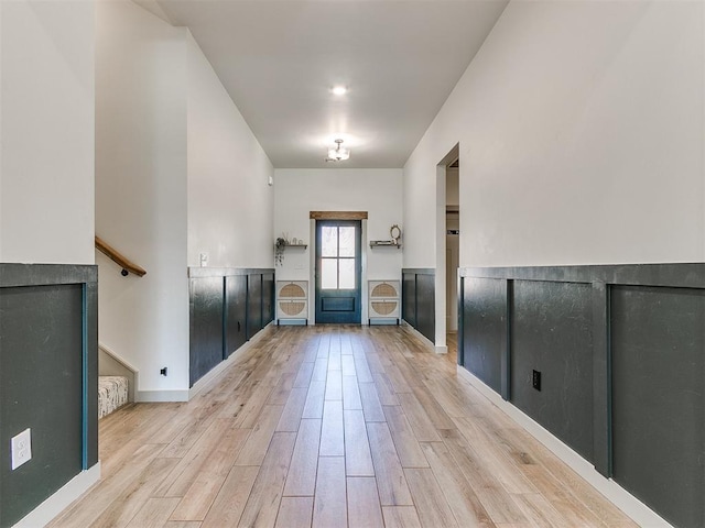 doorway to outside with light hardwood / wood-style flooring