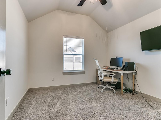 carpeted office with ceiling fan and vaulted ceiling