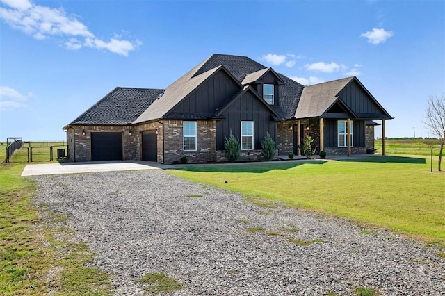 craftsman house featuring board and batten siding, a front lawn, fence, concrete driveway, and a garage