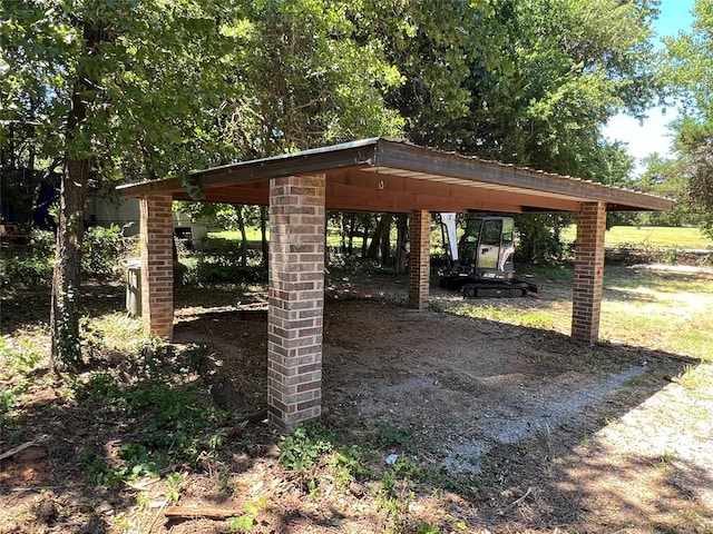 view of yard featuring a carport