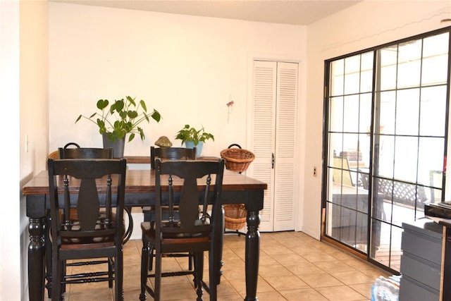 5932 NW 62nd Ter, Oklahoma City, OK 73122 - dining room featuring light tile patterned flooring