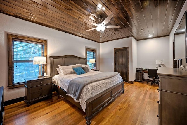 bedroom with crown molding, ceiling fan, light hardwood / wood-style flooring, and wooden ceiling