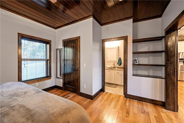 bedroom featuring wood ceiling, ensuite bath, crown molding, and light hardwood / wood-style floors