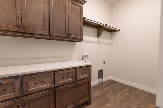 laundry area with electric dryer hookup, cabinets, and washer hookup