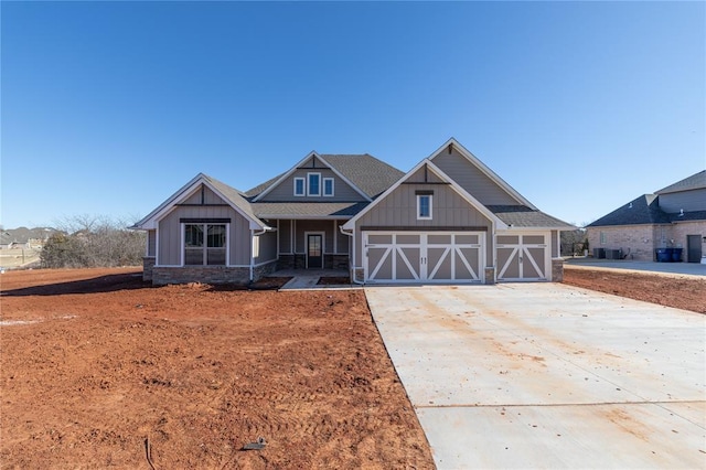 craftsman inspired home with a garage