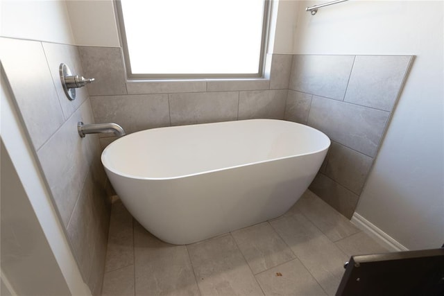 bathroom with a washtub