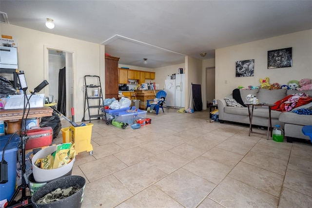 living room with light tile patterned floors