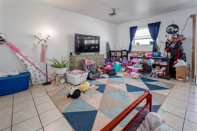 rec room featuring light tile patterned floors