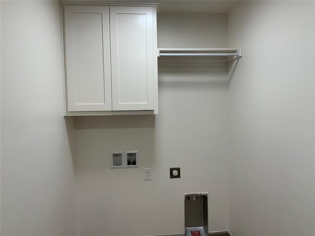 laundry room with cabinets, washer hookup, and hookup for an electric dryer