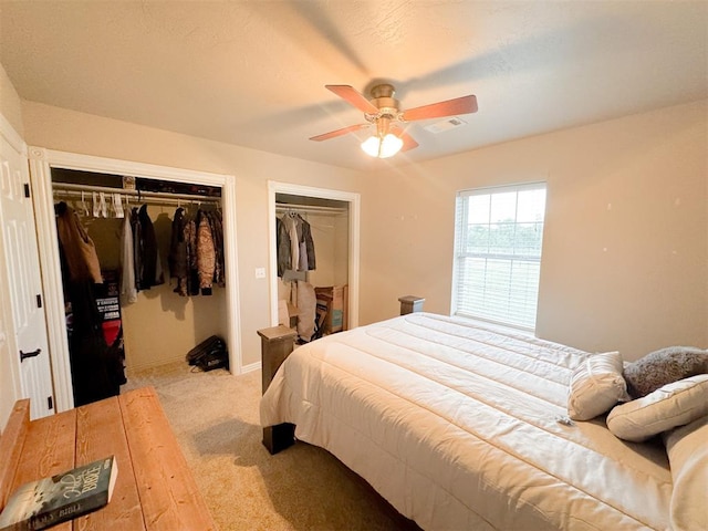 bedroom with ceiling fan and light wood-type flooring