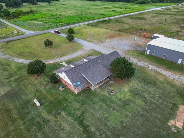 birds eye view of property featuring a rural view