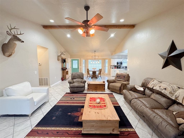 living room with ceiling fan, light tile patterned floors, and lofted ceiling with beams