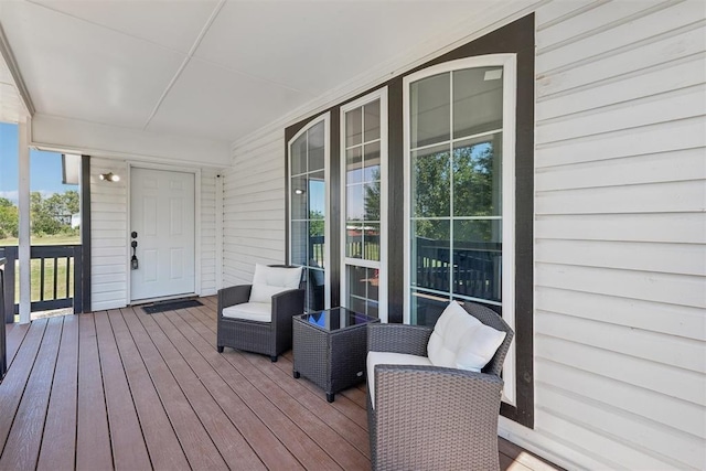 deck with covered porch