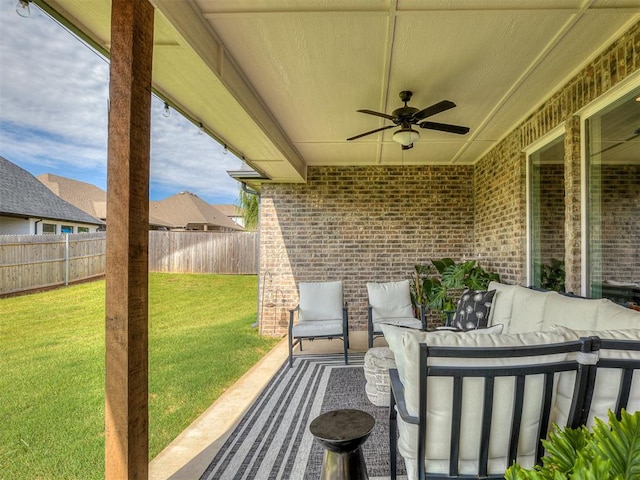 view of patio with an outdoor hangout area and ceiling fan