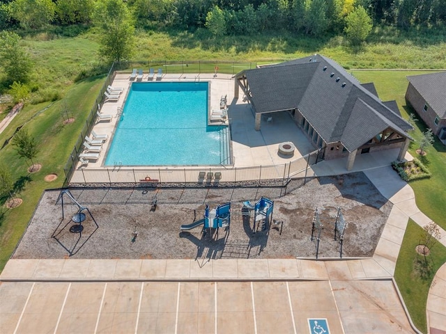 view of swimming pool with a patio area