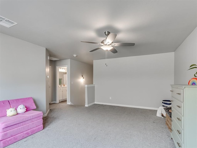 8216 Crew Ln, Edmond, OK 73034 - sitting room featuring light carpet and a ceiling fan