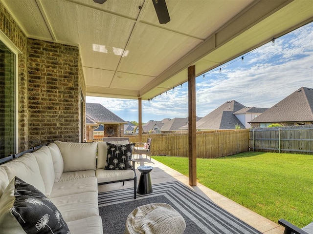8216 Crew Ln, Edmond, OK 73034 - fenced backyard with an outdoor hangout area, a ceiling fan, a patio, and a residential view