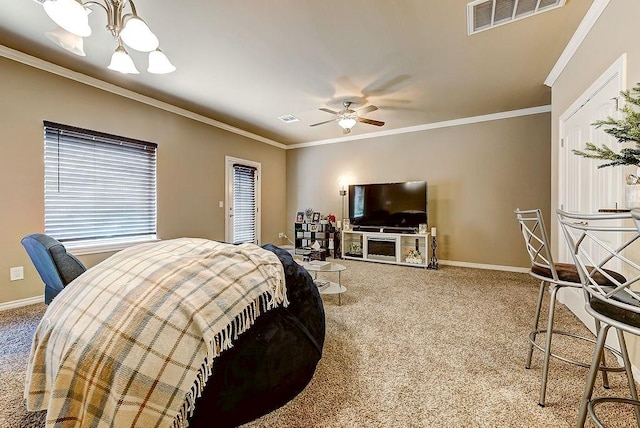 carpeted bedroom featuring crown molding and ceiling fan with notable chandelier