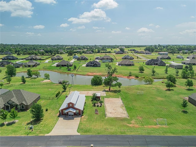 bird's eye view with a water view