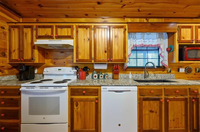 kitchen featuring light stone countertops, white appliances, sink, and wooden ceiling