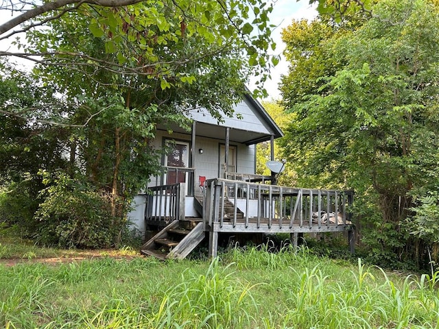 view of front of house featuring a deck