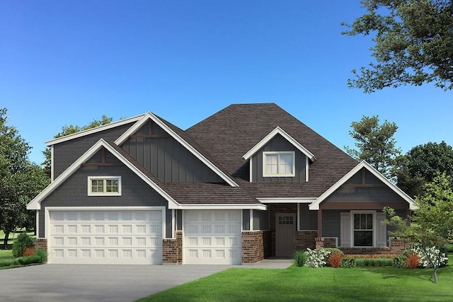 craftsman house featuring a garage and a front lawn