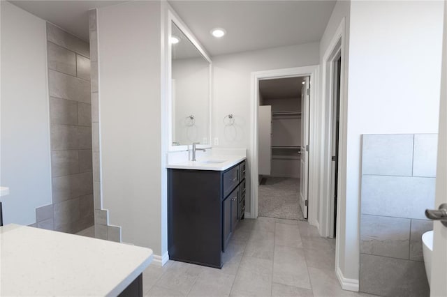 bathroom featuring vanity and tile patterned flooring