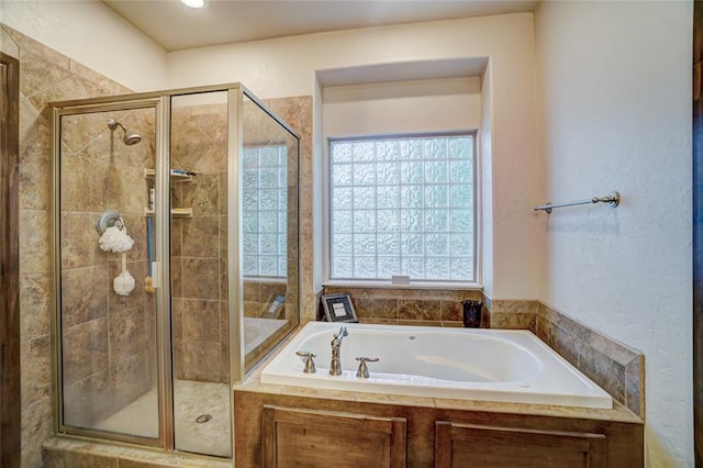 bathroom with independent shower and bath