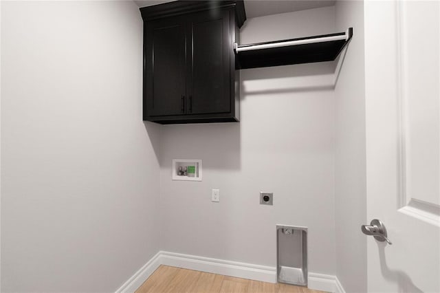 clothes washing area with light wood-style flooring, baseboards, hookup for a washing machine, and electric dryer hookup