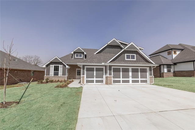 8709 Tyrion Dr, Edmond, OK 73007 - craftsman house featuring board and batten siding, a front lawn, roof with shingles, a garage, and driveway