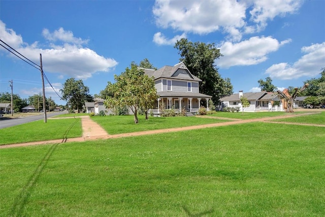 view of front of property featuring a front lawn