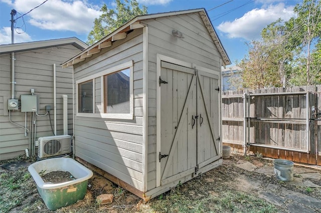 view of outdoor structure with ac unit