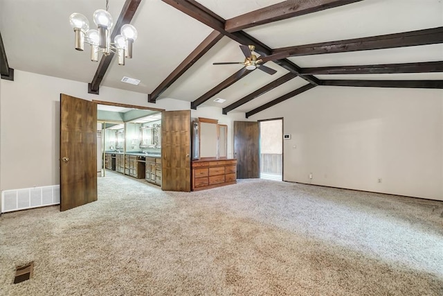 unfurnished living room featuring carpet, lofted ceiling with beams, and ceiling fan with notable chandelier