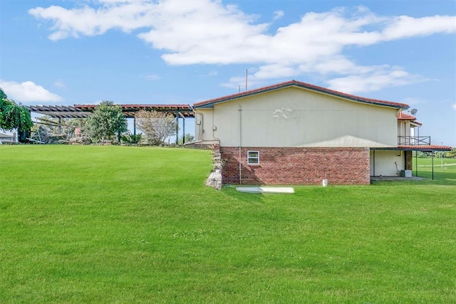 view of property exterior featuring a lawn