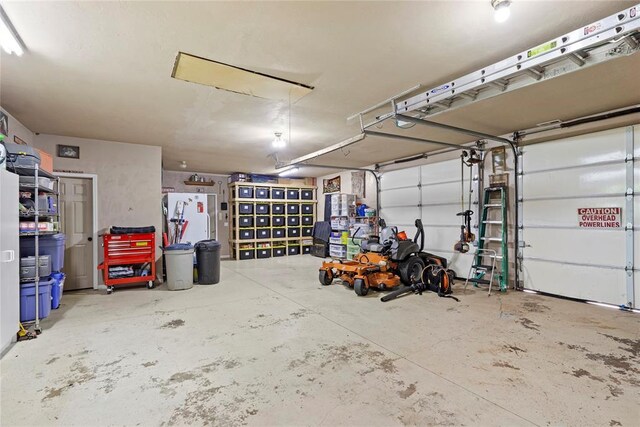 garage with white refrigerator