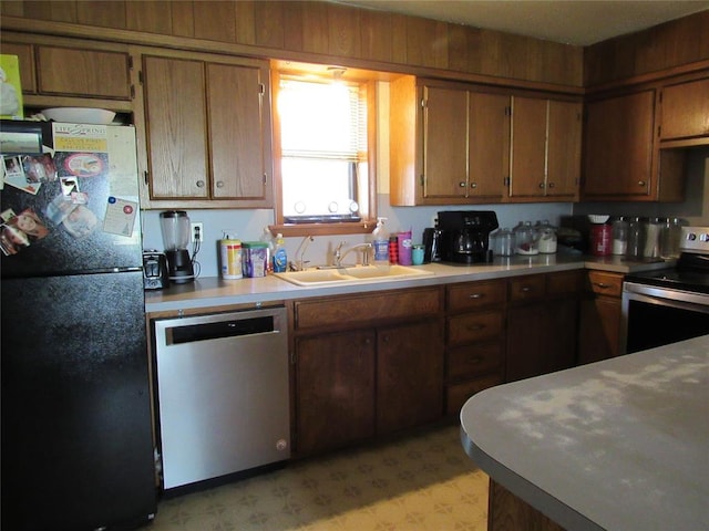 kitchen featuring stainless steel appliances and sink