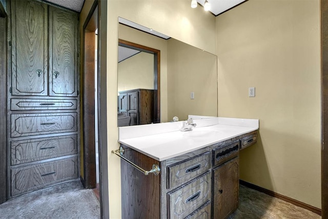 bathroom featuring vanity and concrete floors