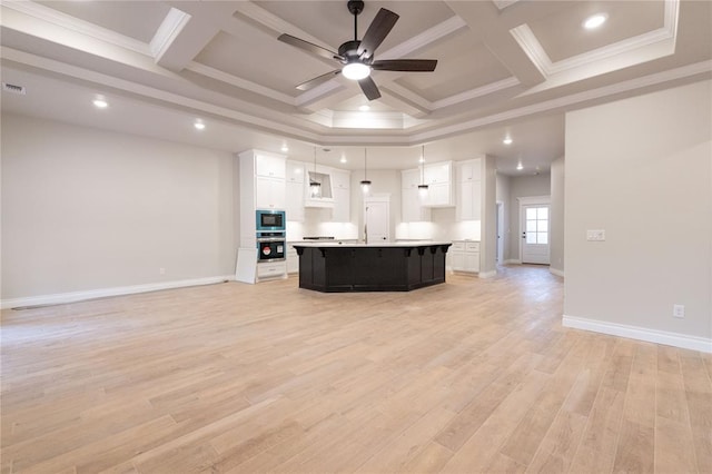 unfurnished living room with light wood-type flooring, baseboards, coffered ceiling, and ornamental molding