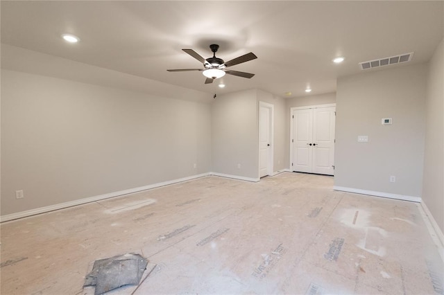 empty room with a ceiling fan, recessed lighting, visible vents, and baseboards