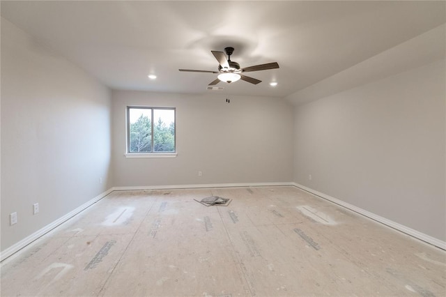 unfurnished room featuring a ceiling fan, visible vents, and baseboards