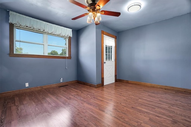 unfurnished room with hardwood / wood-style floors, ceiling fan, and lofted ceiling