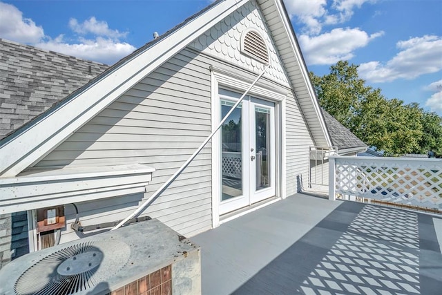 exterior space featuring french doors and central AC unit